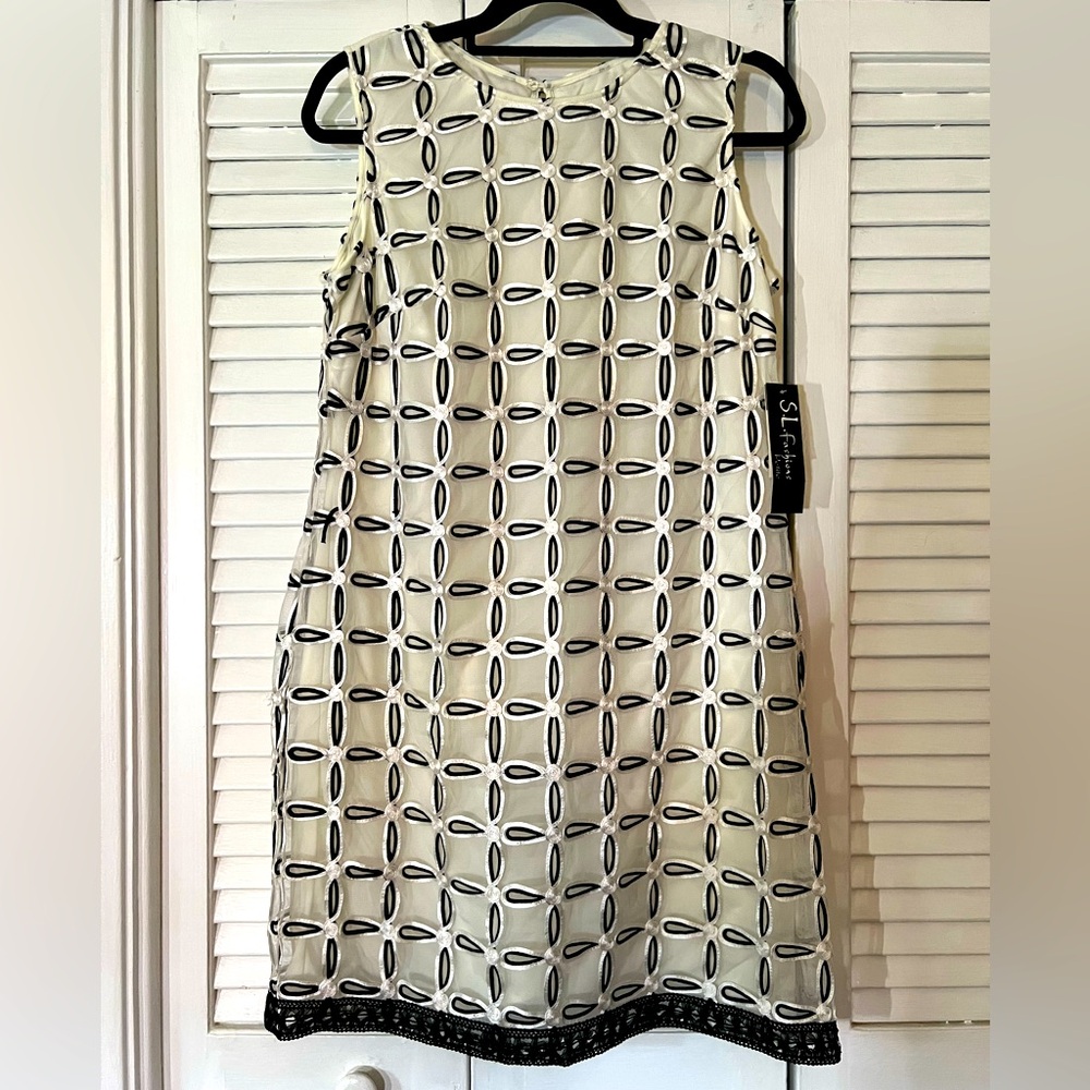 Cream colored dress with beautiful sheer patterned overlay
